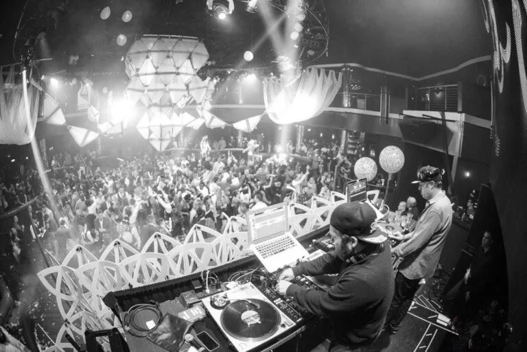 The Captains of Industry DJing a packed club